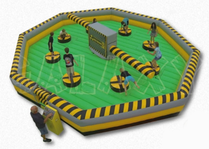 Eight players jumping the Toxic Meltdown mechanical ride rental and attraction rental spinning arms
